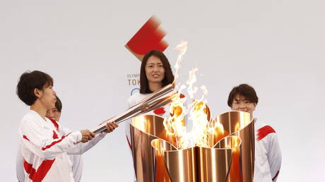 انطلاق رحلة الشعلة الأولمبية من فوكوشيما دون احتفالات جماهيرية