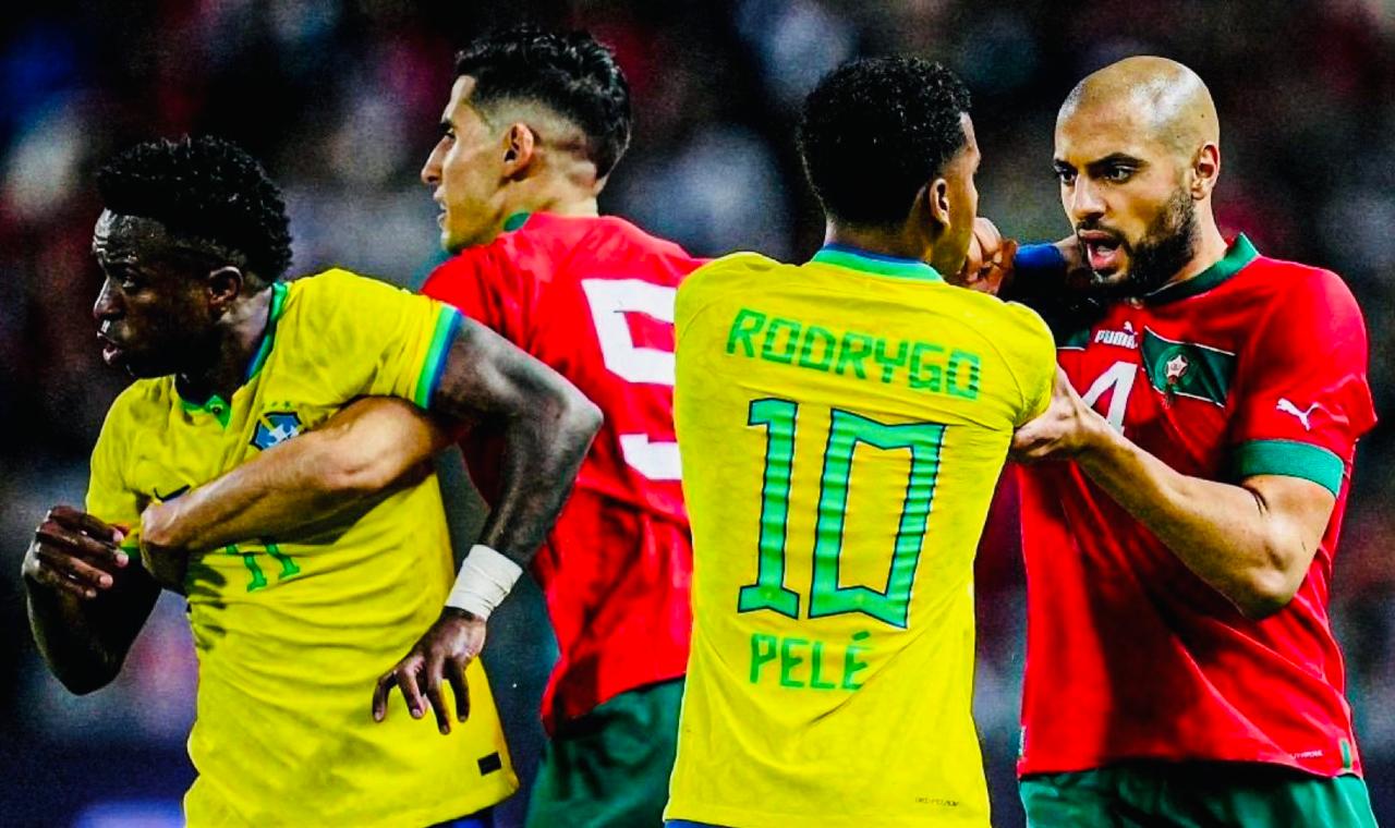مونديال 26. المغرب – البرازيل. مواجهة ثأر الأسود من مؤامرة.. 98 كيف؟ ولماذا؟